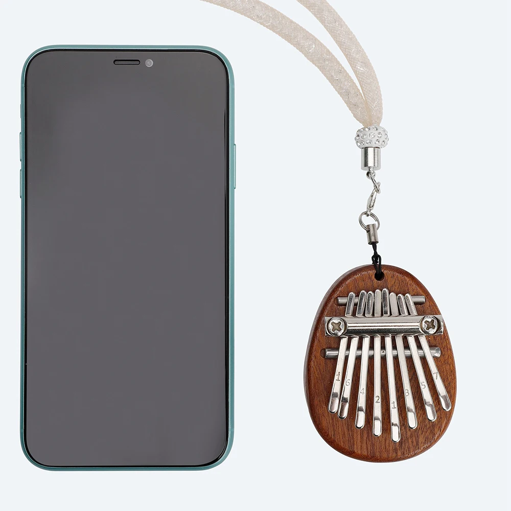 

1 PC Mini Portable 8 Keys Finger Thumb Piano Mbira Solid Wood Toy With Lanyard Pendant Gifts for Beginners Musical Instrument