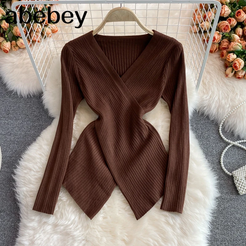 

Женская трикотажная блузка с длинным рукавом и V-образным вырезом