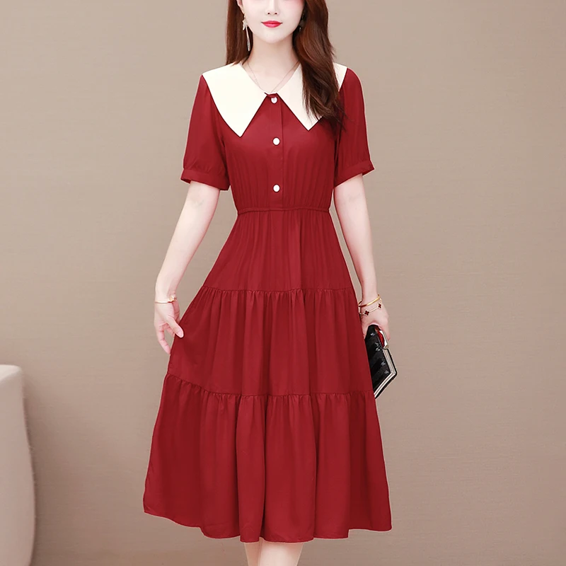 

Женское облегающее платье-трапеция с высокой талией и круглым вырезом