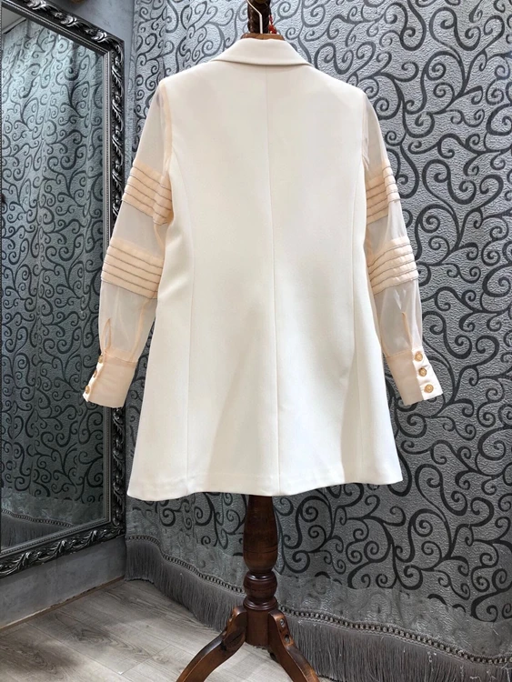 

2020 autumn and winter new women's lapel double-breasted decoration perspective stitching long-sleeved mid-length coat