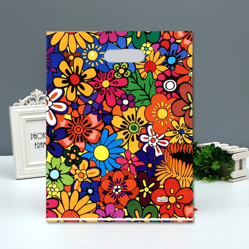 

50PCS / LOT Large Small Printed Clear Plastic Shopping Bags with Handle Boutique Clothes Gift Packaging Bag