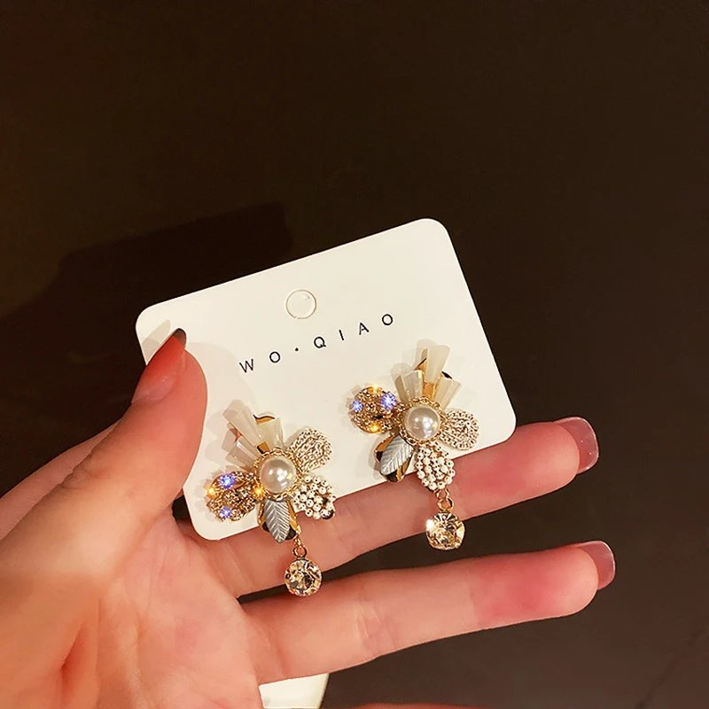

JUWANG Vintage Gold Color Stud Earrings Piercing Fashion Jewelry Cubic Zirconia Flower Style Earrings For Women Pendientes Mujer