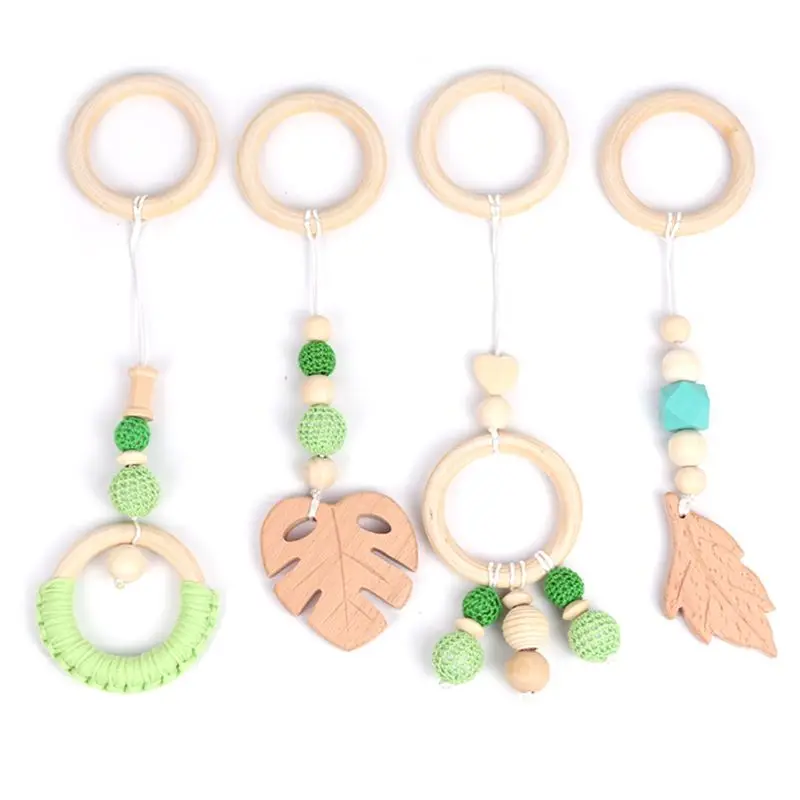 

4Pcs/Set Baby Nordic Gym Frame Hanging Pendants Wooden Ring Teether Molar Gifts N0HD