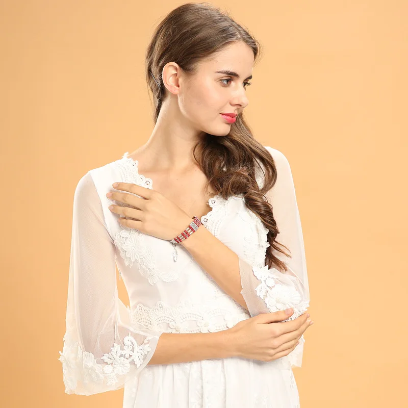 Браслет "Bohemian Vintage" из природных камней с подвеской пера для женщин, национального ручного изготовления, украшенный резными бусинами в стиле бохо.