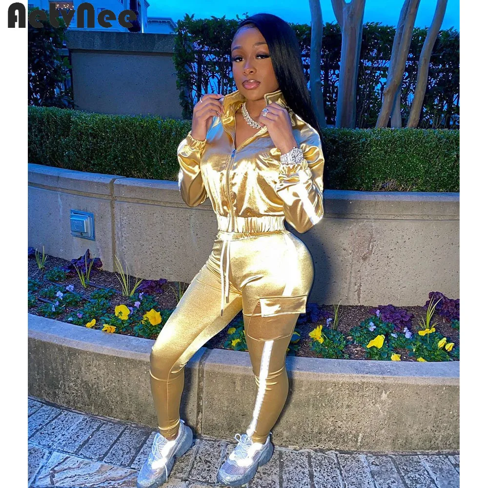 

Женский спортивный костюм из двух предметов, короткий жакет на молнии с воротником-стойкой и длинными рукавами, эластичные брюки-джоггеры с...