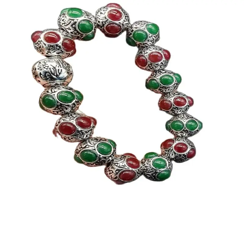 

Браслет на руку из старых тибетских серебряных бусин зеленого цвета с инкрустацией из китайского нефрита