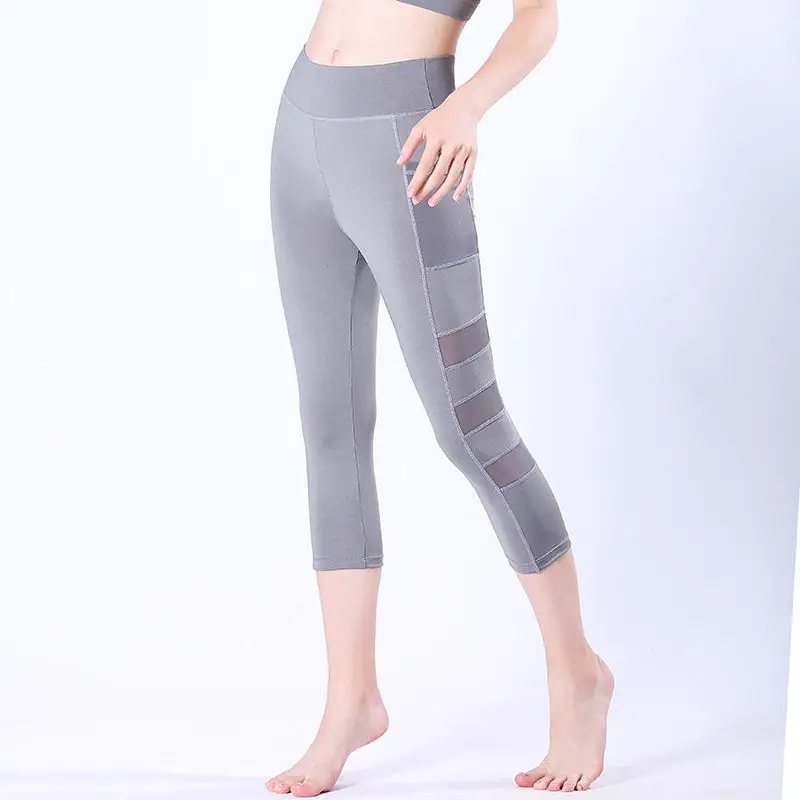

2020 new European and American sports yoga pants, middle waist three section mesh splicing naked sense fitness pants for women