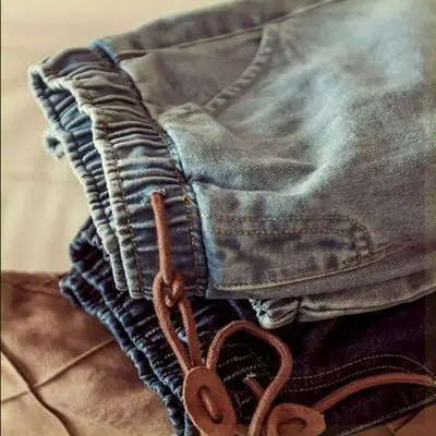 

Fashion 2021 Spring Autumn Young men's clothing beam foot trousers elastic waist Ripped hip hop students feet pants ripped jeans