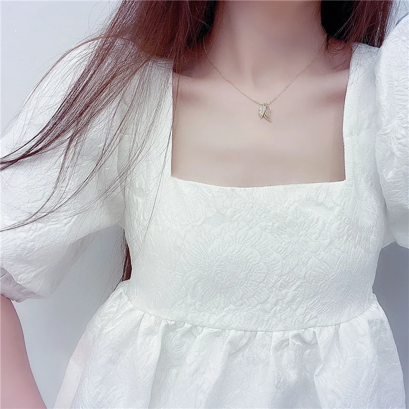 

Korean Original Design Zircon Delicate Wings Pendant Necklace Woman Simple Short Temperament Choker Clavicle Chain Jewelry Gift