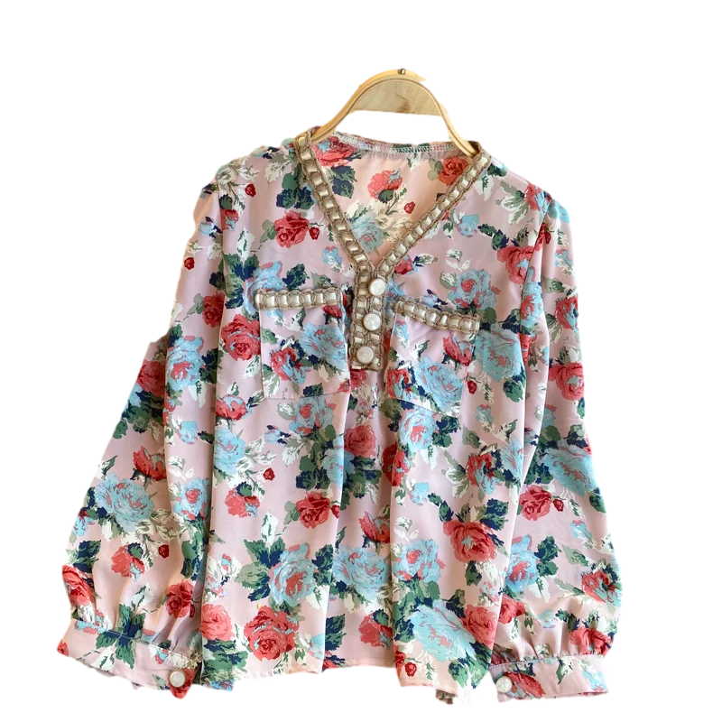 

Top 2020 New Ladies Shirt French Temperament Printing Temperament V-neck Button Decoration Pullover Shirt UK860