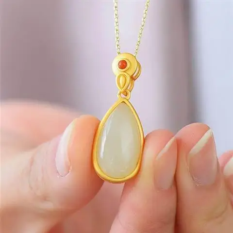 

Natural Hetian White Jade Silver Vintage Drop-Shaped Inlaid S925 Sterling Silver Ancient Style Thick Gold Gilding Craft Pendant