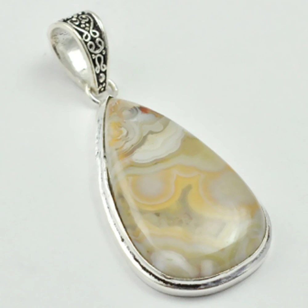 

Crazy Lace Agates Pendant Silvers Overlay over Copper , 55 mm, P3108