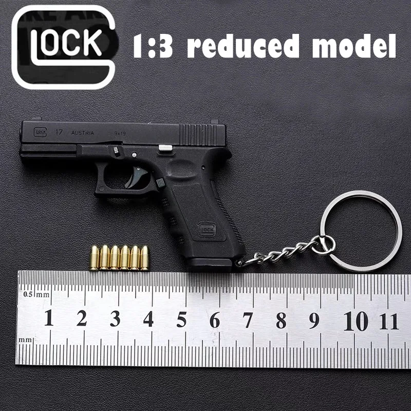 

2021 New 1:3 Glock 17 Pistol Gun Miniature Model Keychain Full Metal Shell Throwing Alloy Boy's Favorite Birthday Gift