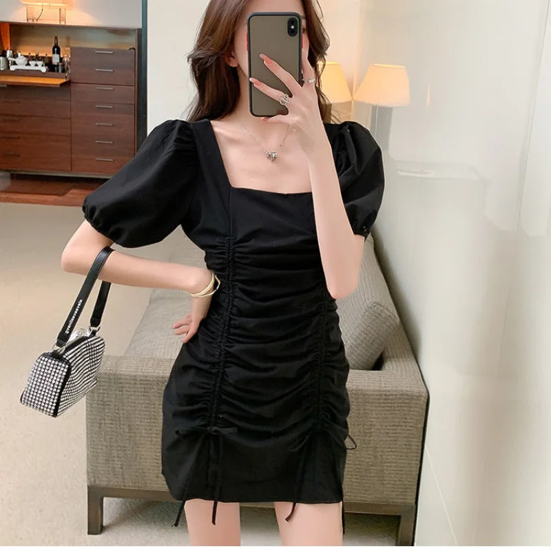

Drawstring rope 2021 new summer small short French appearance puff sleeve skirt design sexy girl skirt Black mini dress women