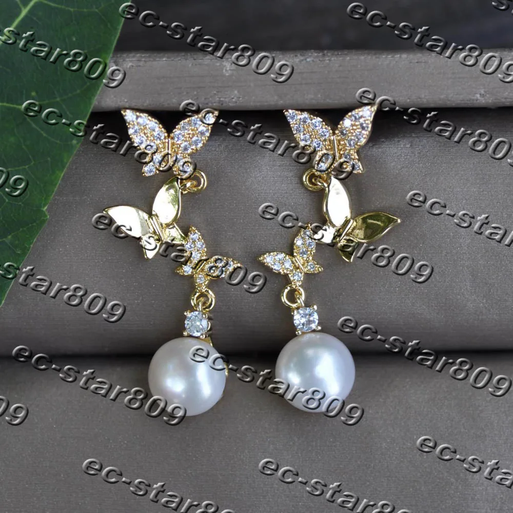 

Z11440 8mm White Round Freshwater Pearl Butterfly Gold-plating Earring