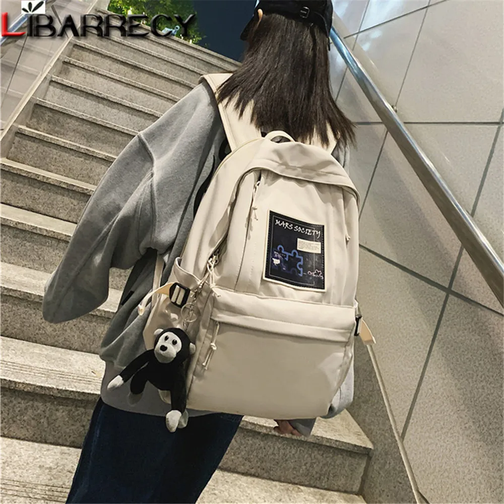 

Fashion Pattern Designer High-quality Women's Backpack Cute Pendant Design High-quality Nylon Ladies Schoolbag Teen Casual Bag