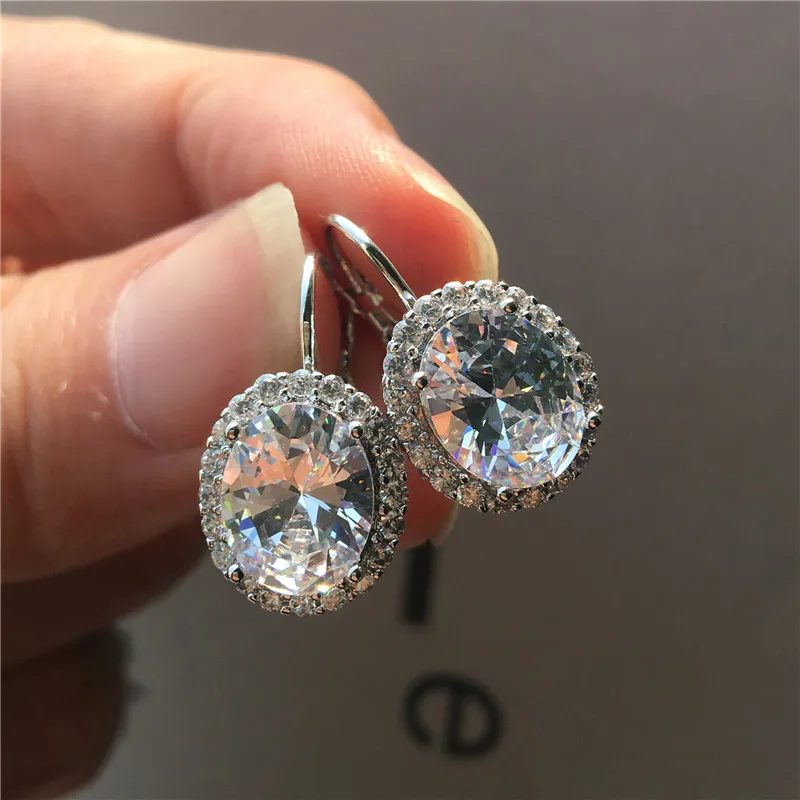 Роскошные женские маленькие овальные серьги с кристаллами серебряного цвета в