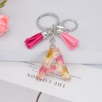 1pc real dried daisy flower letter alphabet keychain crystal resin words key chains car bag tassel pendent charms gift accessory