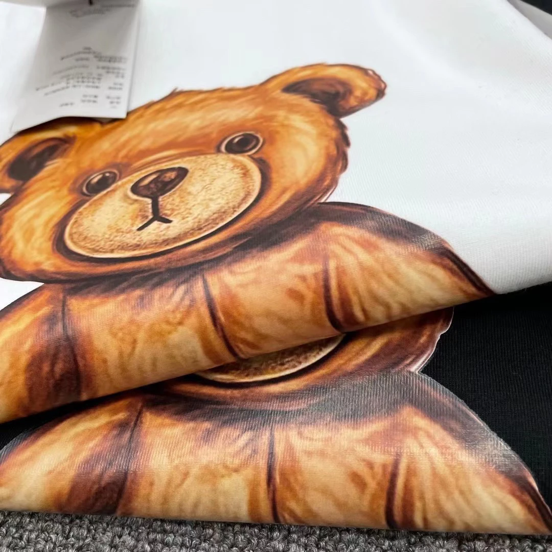 

Spring Summer 2021 Brand New Design Letter Cute Cartoon Football Bear Print T-Shirt For Women's Oversized Tees Men 0447