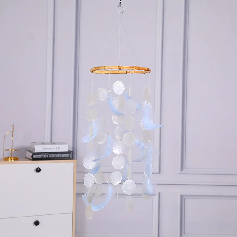 

Simple natural mirror shell feather wind chime gift ocean ornaments homestay scenic pendant photo props