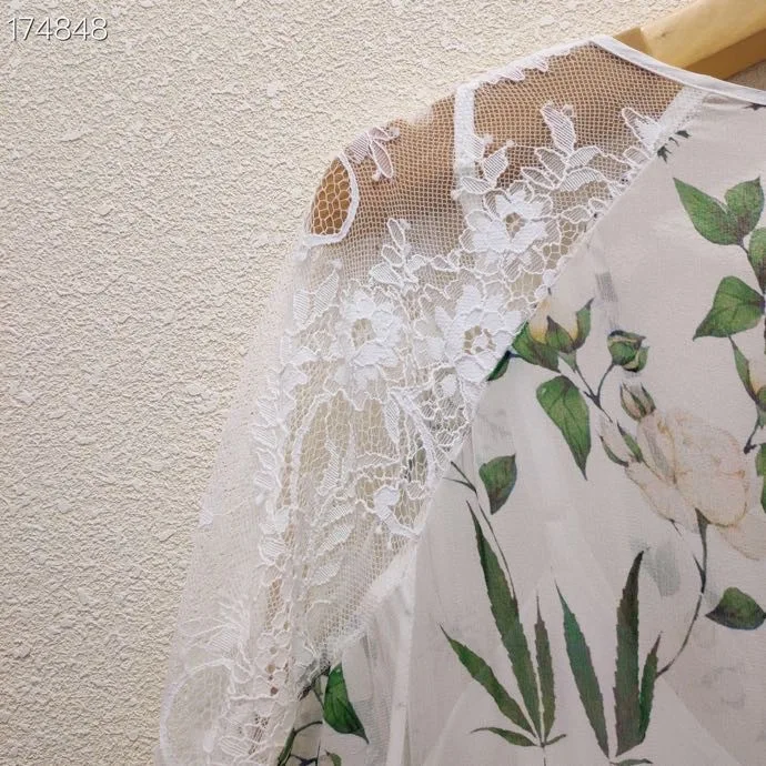 

2021 spring and summer elegant holiday style printing deep V neck shoulder lace stitching slim trumpet sleeve dress