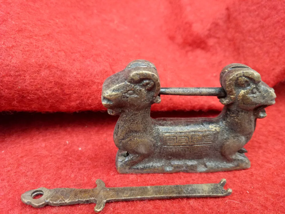 

Collection of ancient Chinese building locks, drawer locks, double headed sheep bronze sculpture