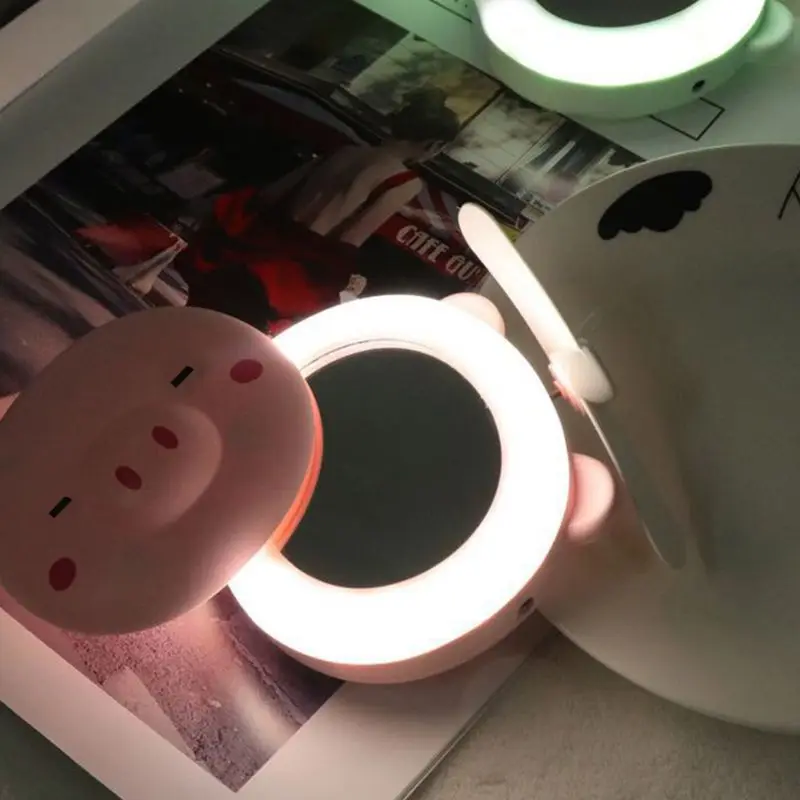 

Pink Mini Cute Pig Head Shape Fill Light LED Mirror Fan USB Portable Charging Pocket Fan Makeup Mirror Retailsale