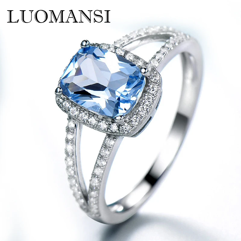 

Женское кольцо с голубым топазом, из серебра 100% пробы