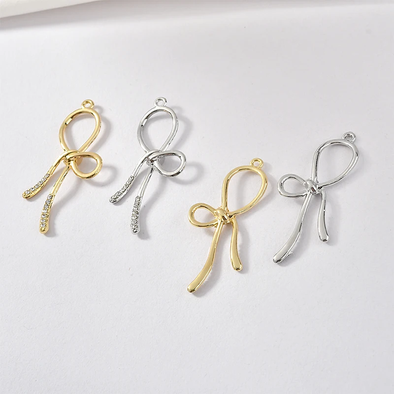 

Diy jewelry making 30pcs/lot cartoon bow ribbon shape alloy floating locket charms fit earring/garment pendant accessory