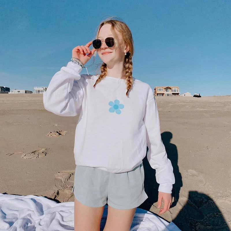 

Женский пуловер свободного покроя с цветочным принтом и длинным рукавом