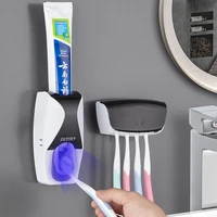 toothpaste automatic squeezer toothbrush holder dispenser wall mounted toothpaste dispenser set bathroom accessories