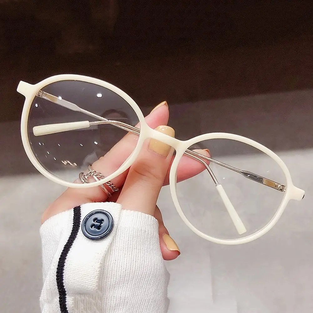 

New Fashion Trend Anti Blue light Glasses Personalized Simple Metal Round Frame Optical Glasses Transparent Eyewear Frames