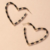 european and american fashion jewelry personality retro alloy black and white line hollow ear stud trend heart shaped earrings