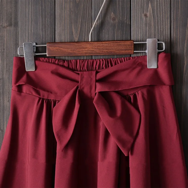

Elegant Women Skirt High Waist Pleated Knee Length Skirt Vintage A Line Big Bow Skirts Solid Vintage Midi Skirt High Quality2021