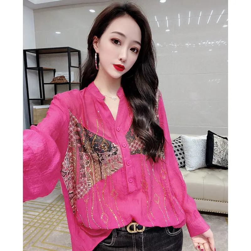 

Early spring new retro floral shirt women's heavy industry hot drilling age reducing slim V-neck top