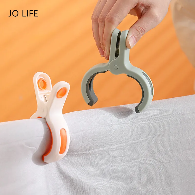 

JO LIFE Traceless Laundry Clothes Pegs Plastic Clothespins Hangers For Drying Towels Sheet Quilt Windproof Clips Laundry Rack