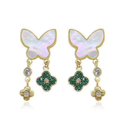 

White Fritillaria shell butterfly four-leaf flower simple temperament retro long palace earrings classical 925 silver tassel