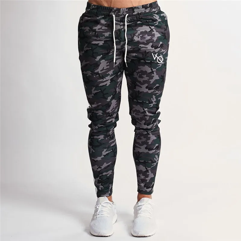 

Spring and autumn new muscle fitness pants training running small foot camouflage elastic body-building exercise clothes