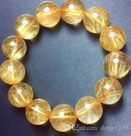 Браслет из натурального кварца с рутилированным кристаллом и титановым жемчугом