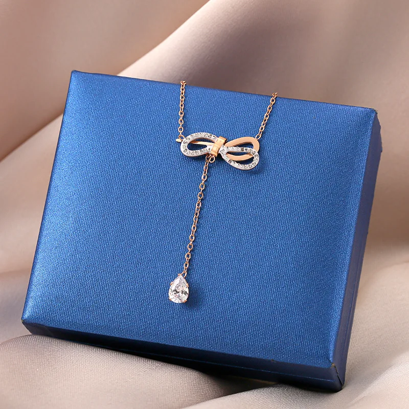 

Shijia tassel bowknot titanium steel necklace female 18k rose gold non-fading net red with jewelry temperament clavicle chain