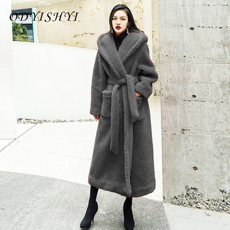 

2021 Winter Jacket Women's Fashion Teddy Coat Female Lapel Hooded Belt Faux Fur Jacket Ladies Warm Outwear Plus Size Long Parka