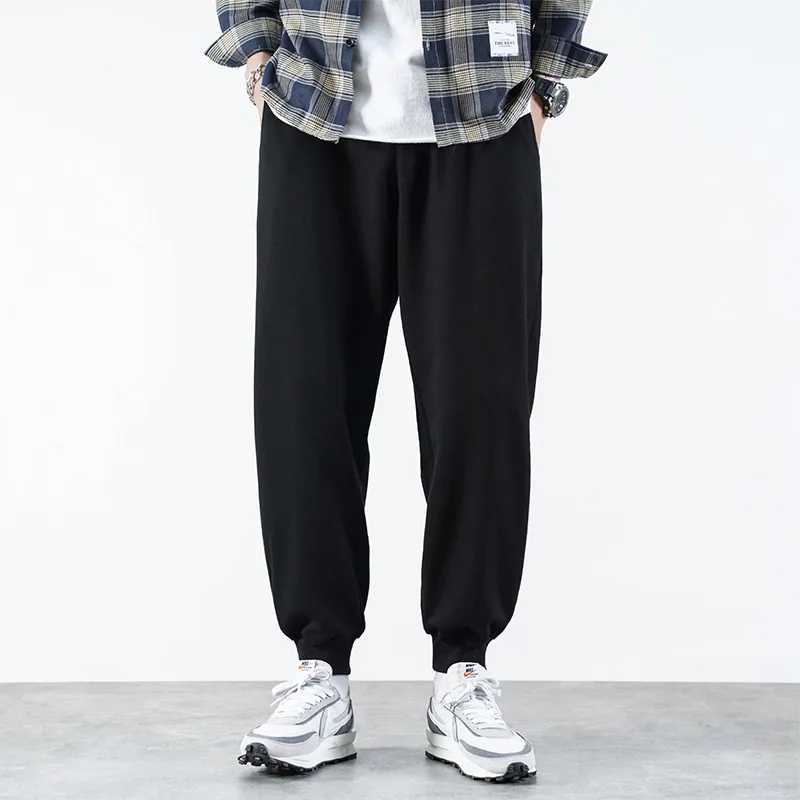 

2021 Spring And Autumn New Casual Sports Pants Men's Japanese Loose Bouquet Trousers Casual Nine Points Trend Knit Sports Pants