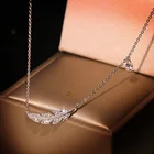 NPKDS изысканное богемное ожерелья с подвеской в виде пера для женщин AAA циркониевое ожерелье эффектные Свадебные ювелирные изделия