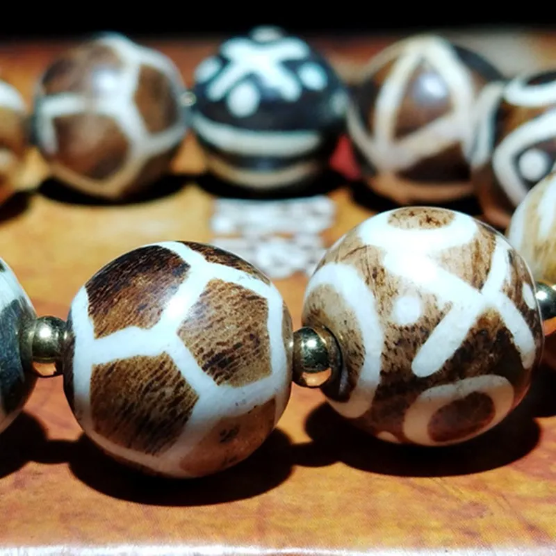 

Dzi Beads Sideline Old Bontic Bracelet Wooden Round Wood Fossil Ground Bodhi Cultural inheritance of mysterious national history