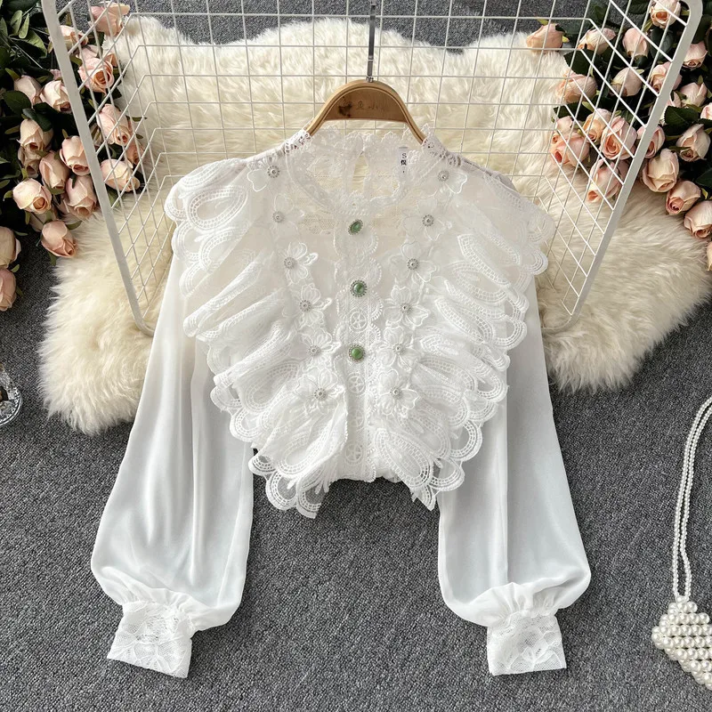 

Блузка женская многослойная на пуговицах с оборками и цветочным принтом