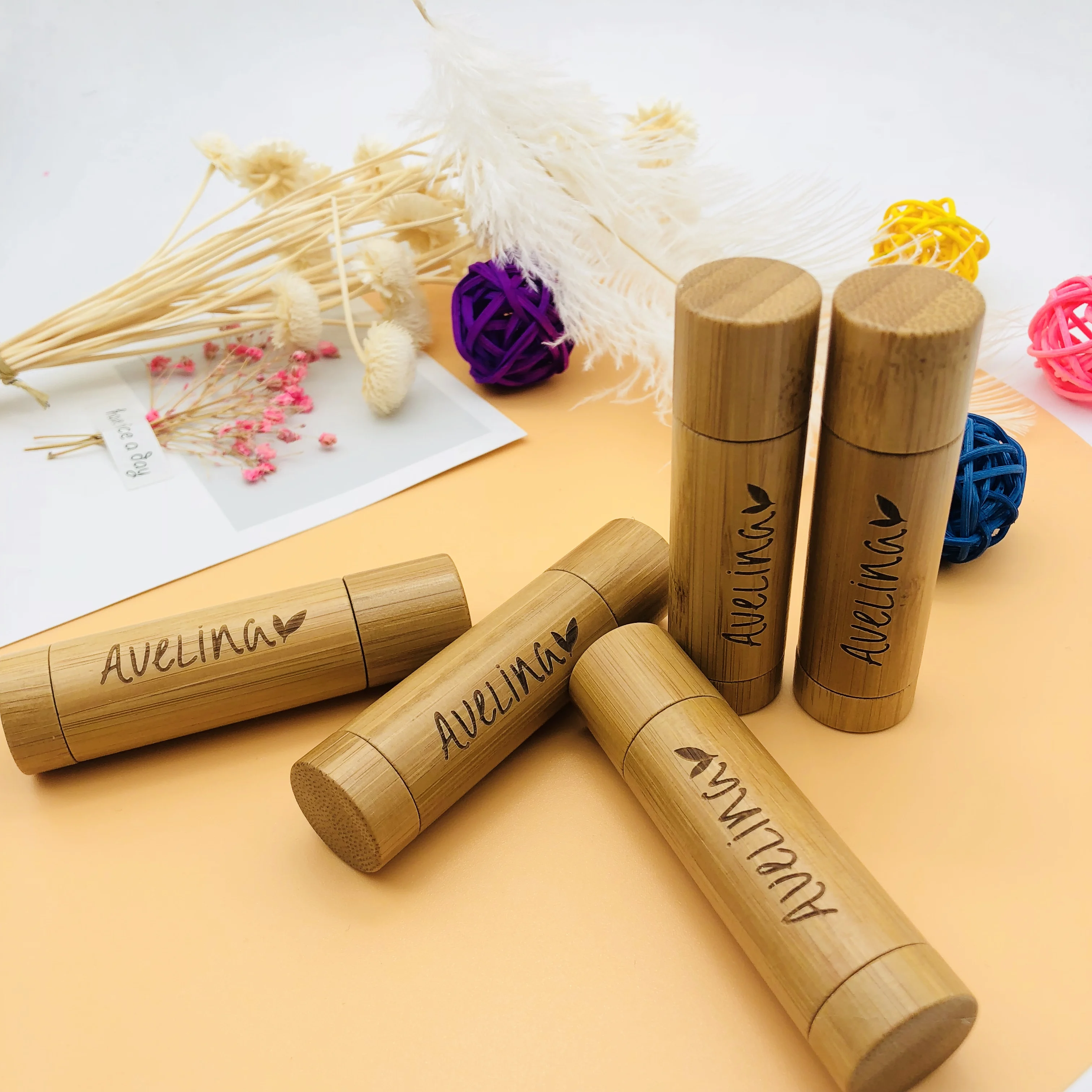 

Wholesale Engraving 100pcs 5ml Natural Wooden Bamboo Makeup Packaging Diy Empty Lip Balm Containers Lipstick Tubes With Lid