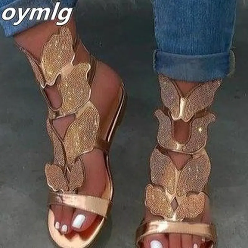 Сандалии женские с ремешком на щиколотке плоская подошва блестящие гладиаторы