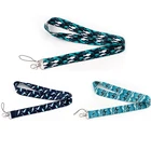 Забавные брелоки J2889 в виде мультяшного дельфина из мультфильма со шнурком, аксессуар для телефона, значок с USB, держатель для идентификационной таблички, ярлыки, шнурок на шею