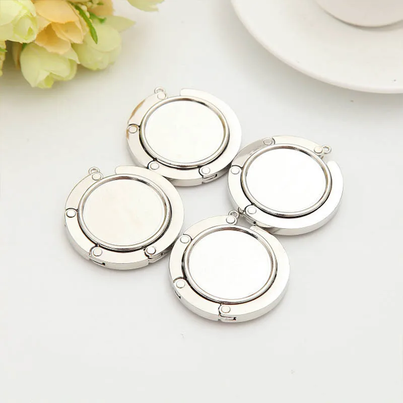 

1 шт. серебряные женские принадлежности, портативная вешалка для сумок, складной держатель для сумок, крючок для сумок из сплава с кристалла...