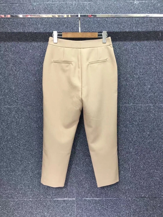 

2021 early spring new women's symmetrical pocket decoration solid color casual all-match trousers 106
